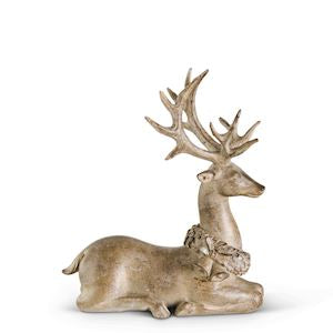 SITTING LIGHT BROWN DEER