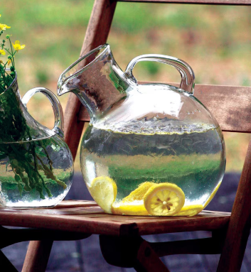 Small Mouth Round Tilted Pitcher