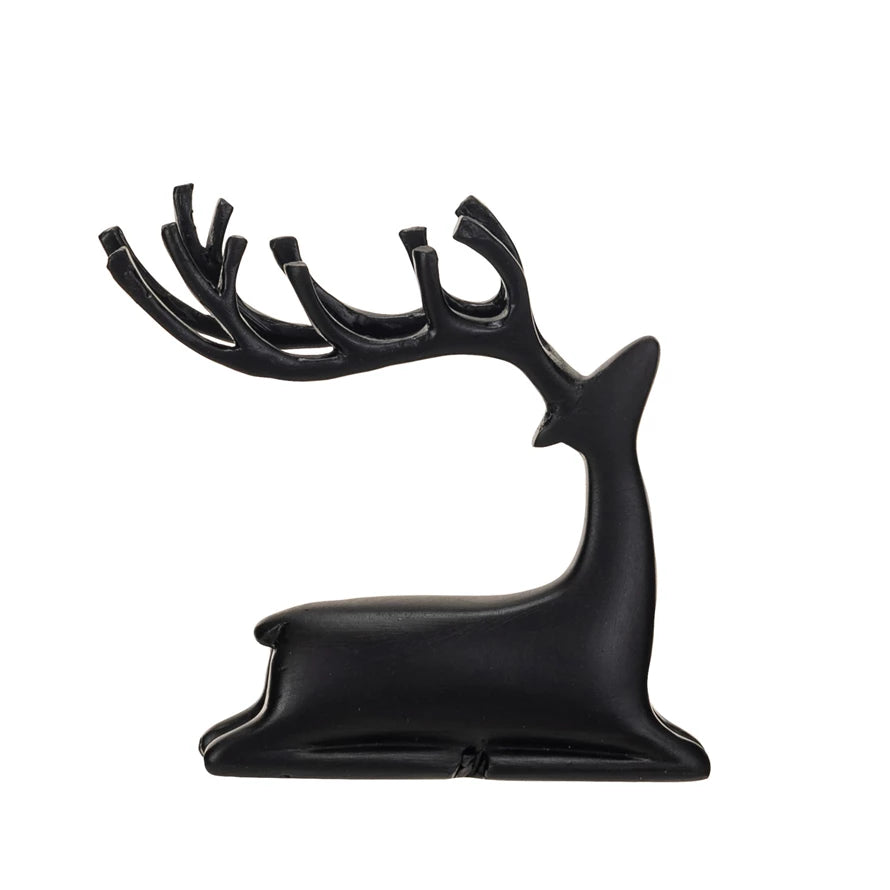 BLACK SITTING REINDEER